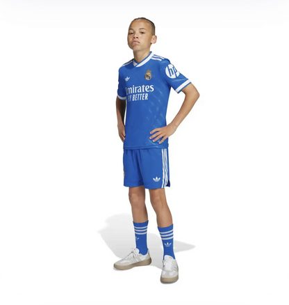 Maillot Réal Madrid third 2026 bleu pour enfant .